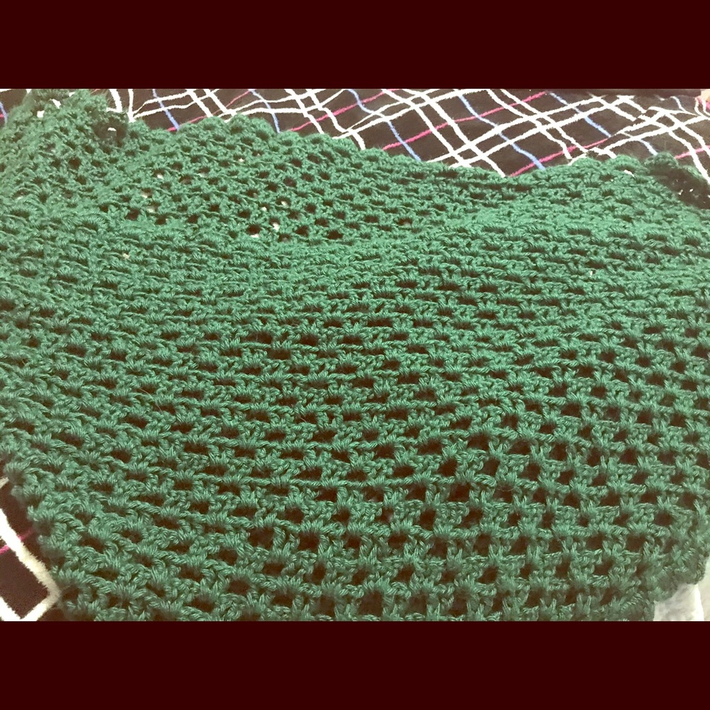 Dark green knitted Shawl.